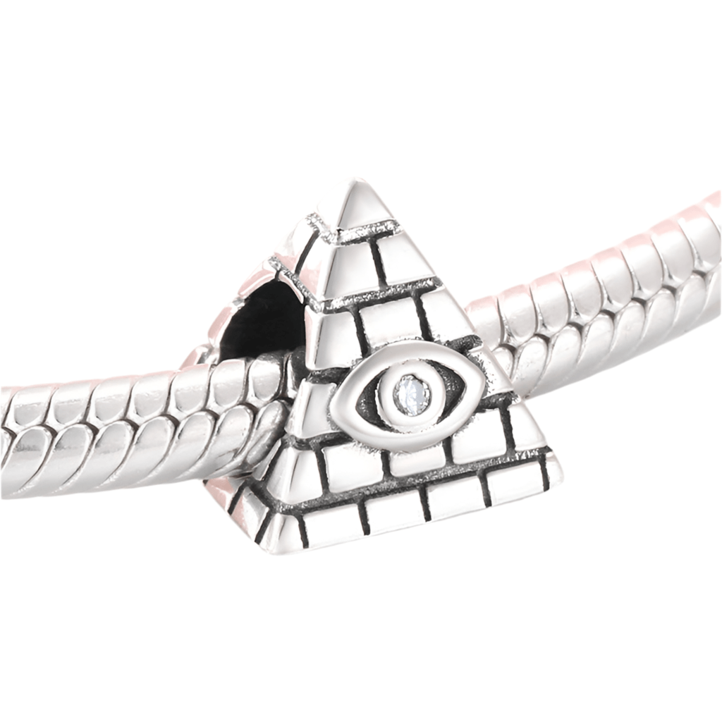 Eye of Providence Charm in sterling silver shaped like a pyramid with an engraved divine eye, symbolizing protection and guidance.