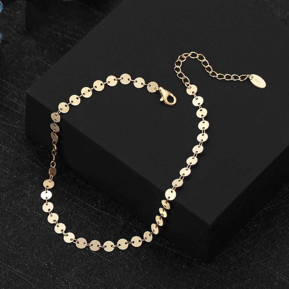 Gold disc chain anklet from the Stunning Stars Anklet collection, minimalist yet elegant for everyday wear or layering.