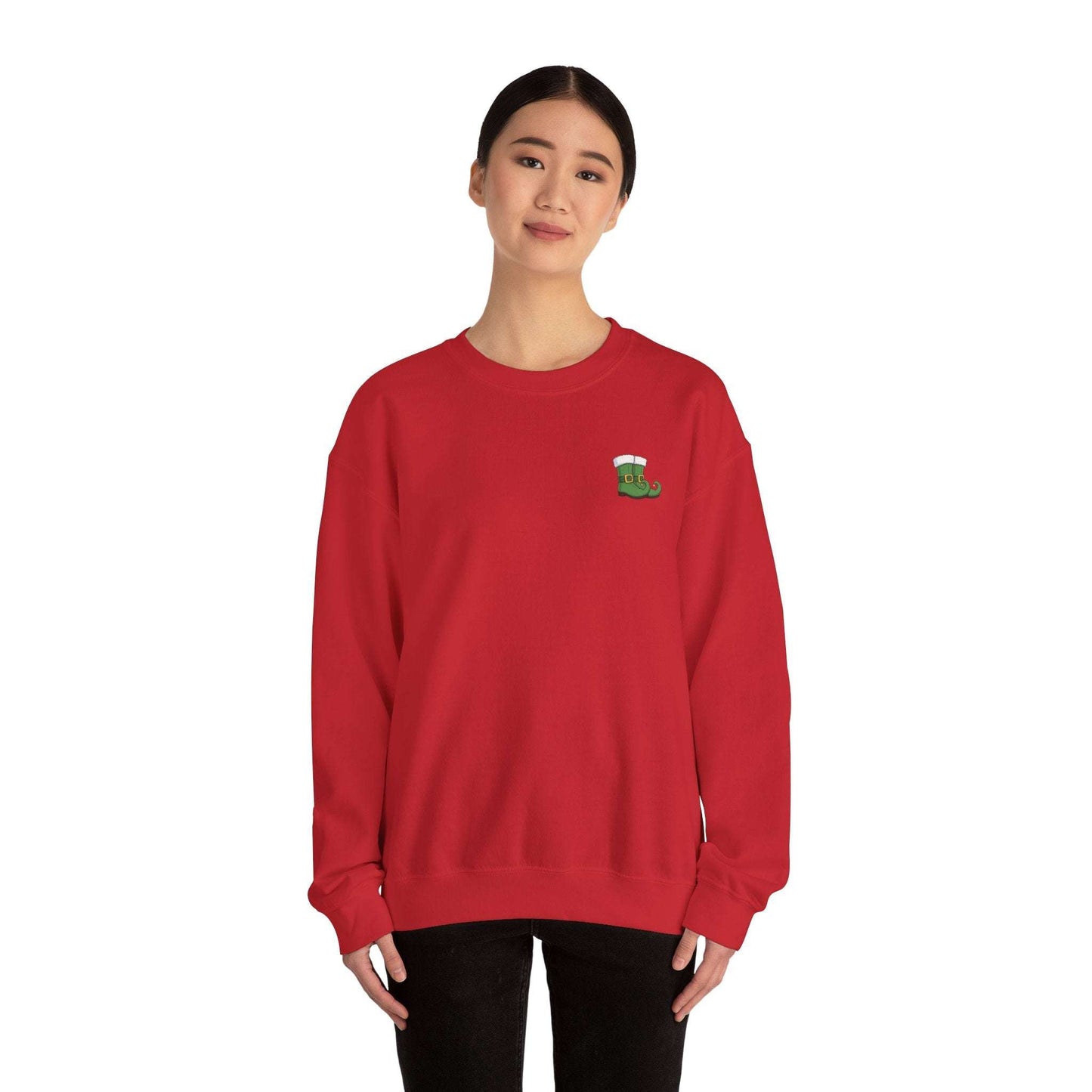 Model in red Elf Sweatshirt featuring elf boot print, unisex holiday apparel for Christmas parties and gifts.