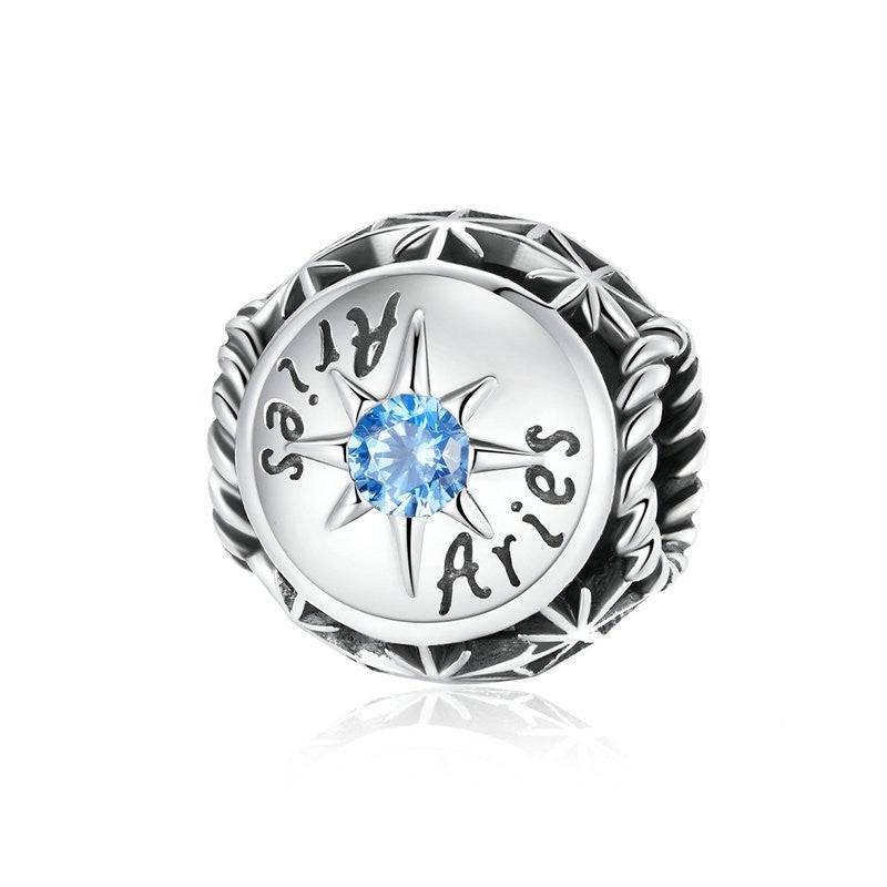 Aries Horoscope Charm with blue zircon gem in celestial star design. Zodiac jewelry from Horoscope Charms - Zodiac Zircon Jewelry collection.