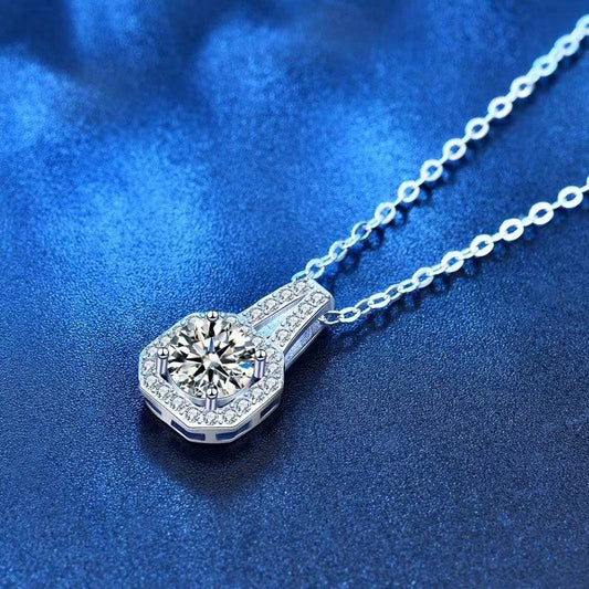 Moissanite Chain Necklace featuring a radiant drop pendant with pavé accents on a shimmering silver chain. Perfect for upscale jewelry collections.