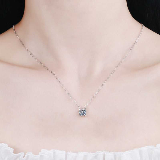 Square Silver Moissanite Necklace worn by a woman, showcasing its elegant and minimalist design with a sparkling moissanite stone on a silver chain.