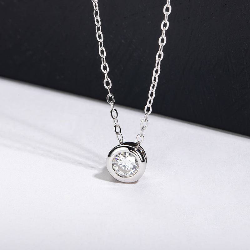 Minimalist Classic Moissanite Necklace with 4.0MM silver pendant and white gold plating. A versatile piece for everyday elegance.