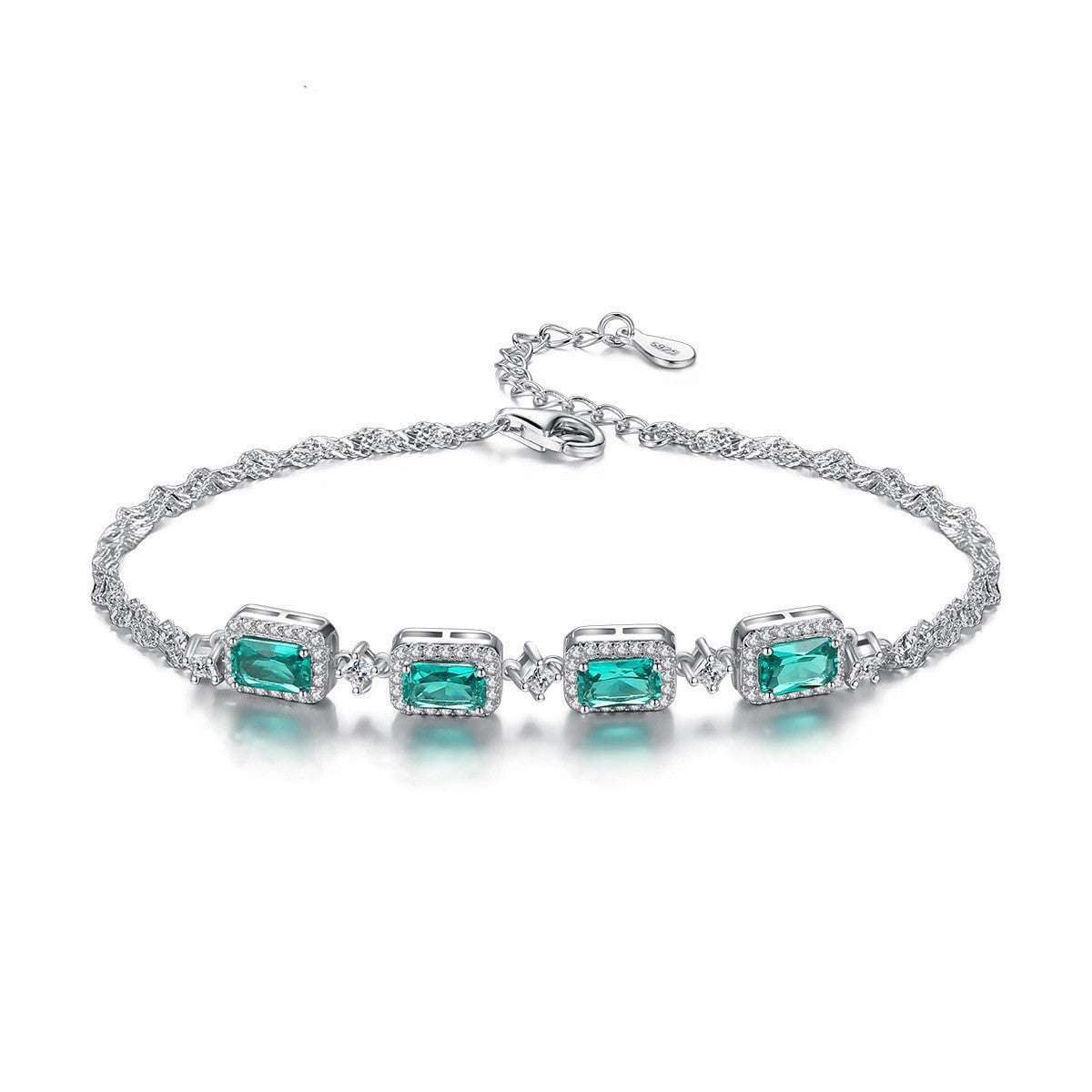 Emerald Bracelet - Baguette Cut Emerald with four rectangular green stones set in sterling silver, ideal for elegant and casual wear.