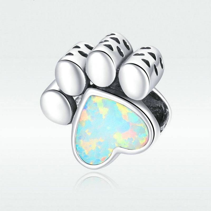 Heart-shaped opal dog paw charm in silver, ideal for adding a cute pet-themed touch to any bracelet.