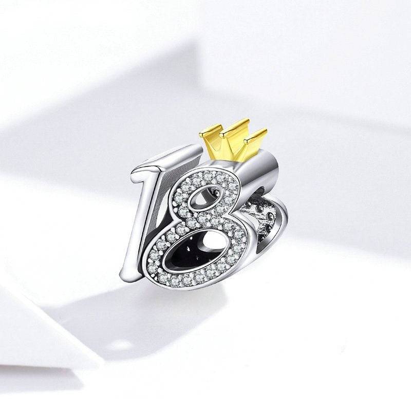 Close-up of 18th Birthday Charm for Bracelets with sparkling stones and gold crown, a stylish keepsake for turning 18