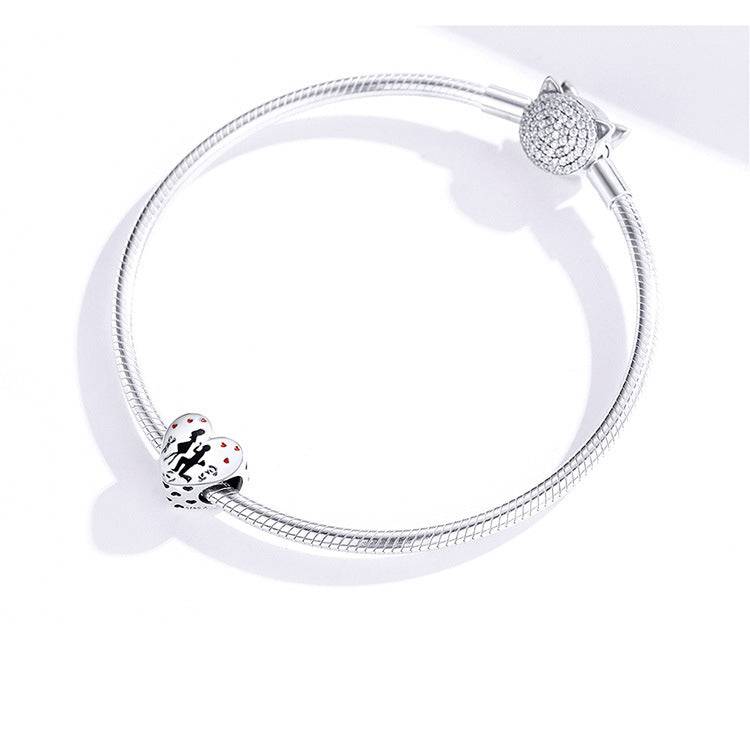 Elegant Engagement Charm attached to a silver bracelet, highlighting its romantic design and perfect fit for love-themed jewelry collections.