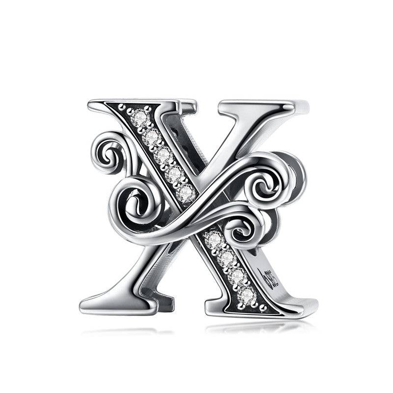Stylish Letter Charm 'X' in silver with crystal inlay and swirling accents, perfect for customising charm bracelets.