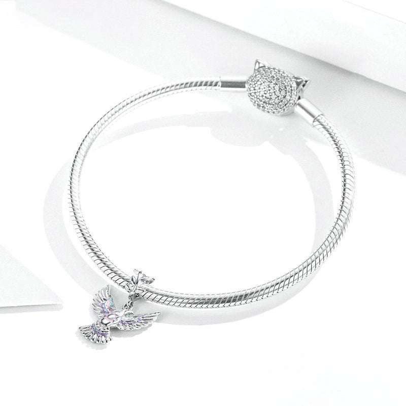 Sterling silver bracelet featuring the Dove Charm, showcasing a peaceful bird design for a meaningful jewelry accessory.