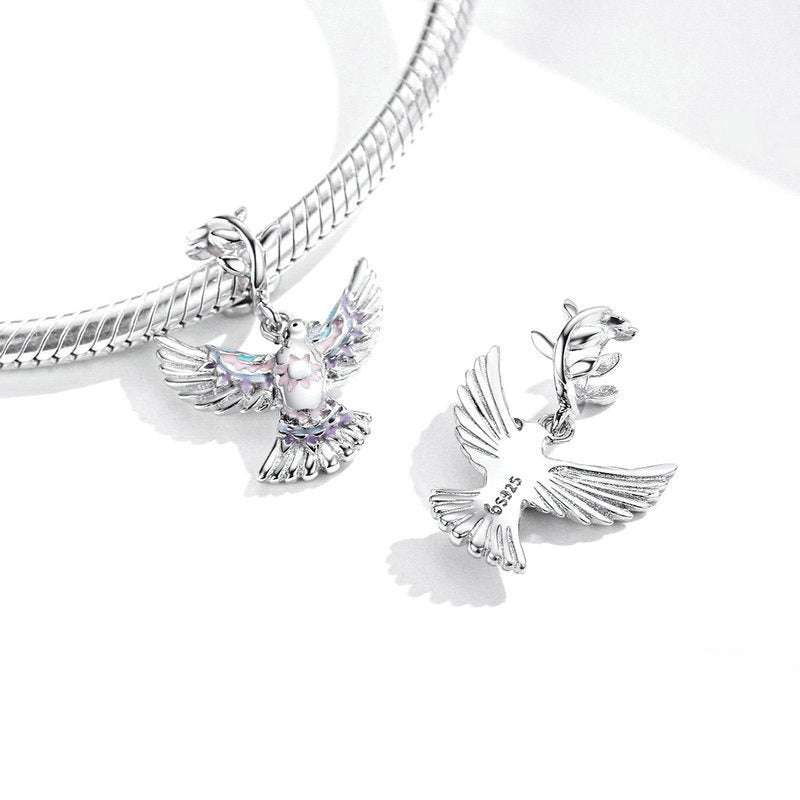 Front and back view of Dove Charm in 925 sterling silver, highlighting intricate wing details and secure clasp for charm bracelets.