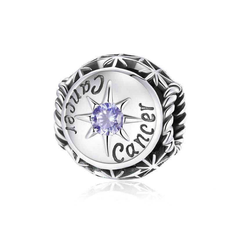 Cancer Horoscope Charm adorned with light purple zircon and engraved zodiac name. Elegant astrology charm from Horoscope Charms collection.