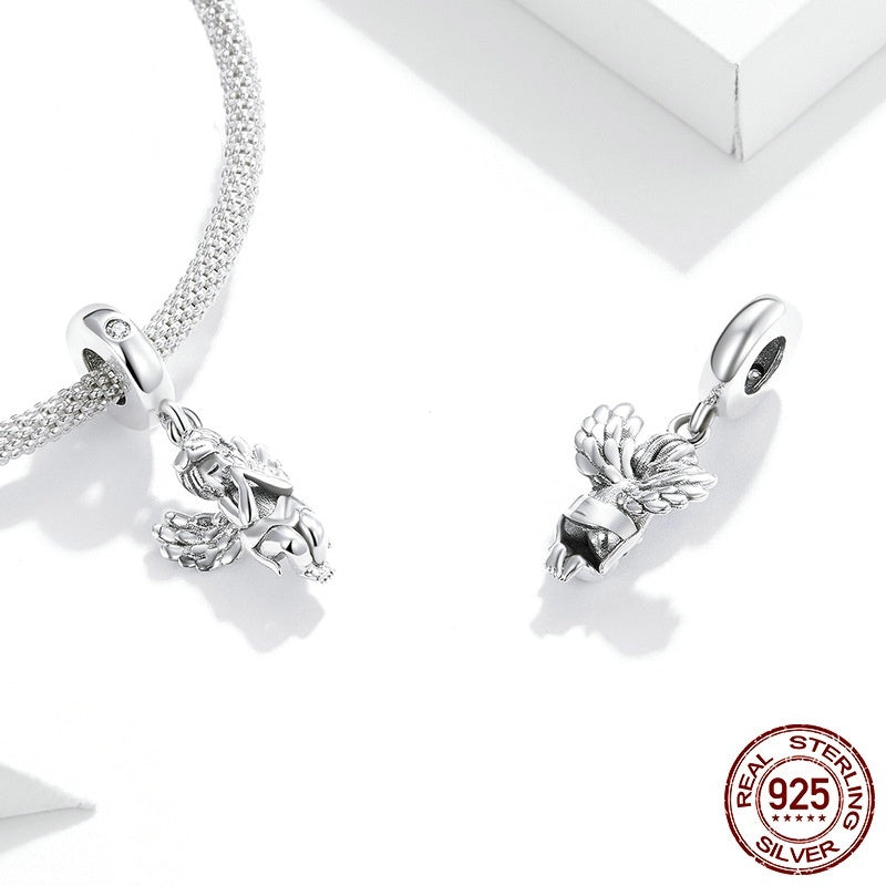 Pair of Little Angel Charms in 925 sterling silver, showcasing front and back views. Ideal for charm bracelets or necklaces.