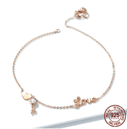 Charming Love Anklet for Bracelets in rose gold with heart, key, and 'Love' charms. Made of 925 sterling silver for elegant, romantic style.