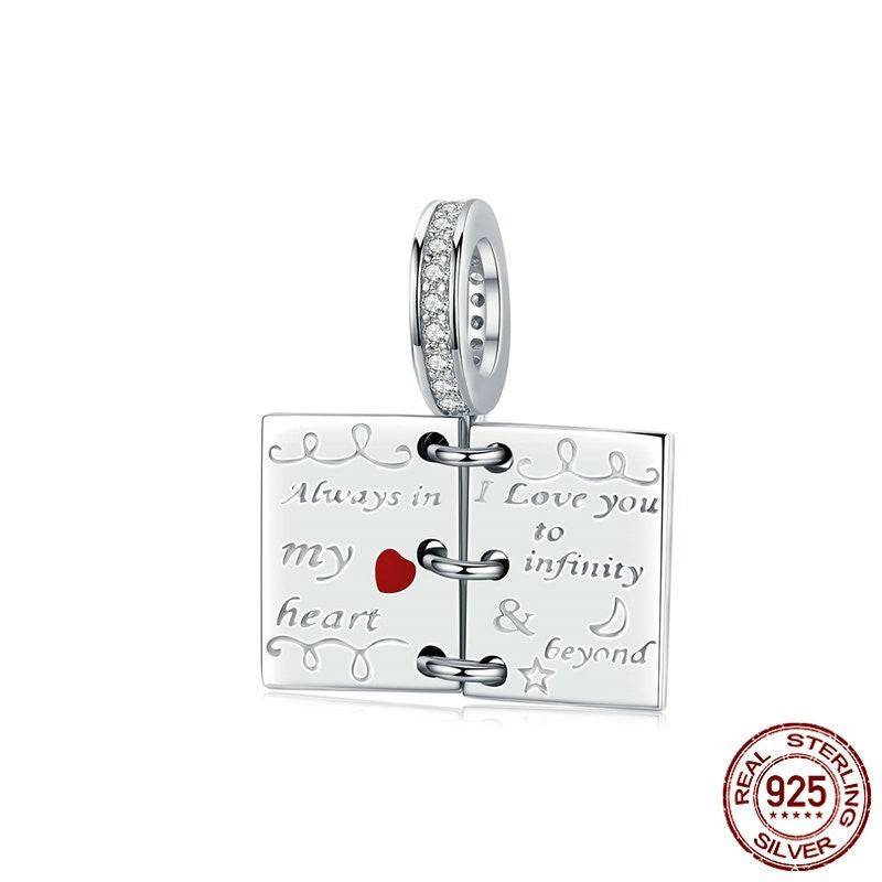 Romantic Love Notes Charm for Bracelets crafted in 925 sterling silver, designed like a notebook with love message and sparkling loop.