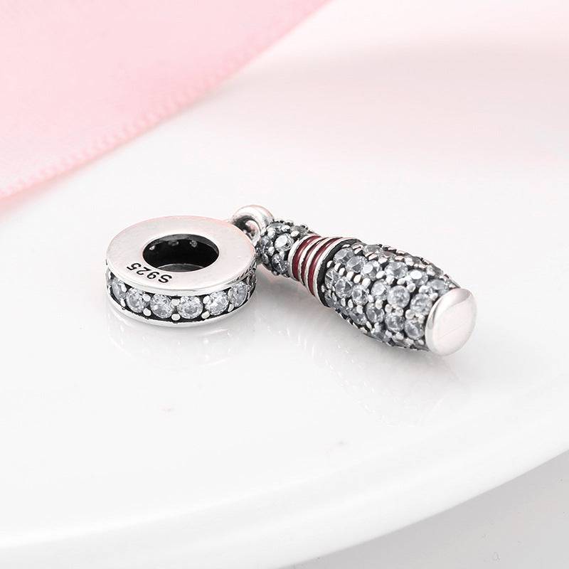 Bowling pin charm with rhinestone accents from the Sports Charm collection, perfect for sporty jewelry enthusiasts.