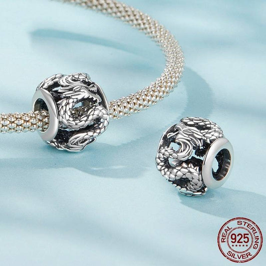 Dragon Charm - Sterling Silver S925 featuring intricate mythical dragon design on a round bead, ideal for bracelets or necklaces.