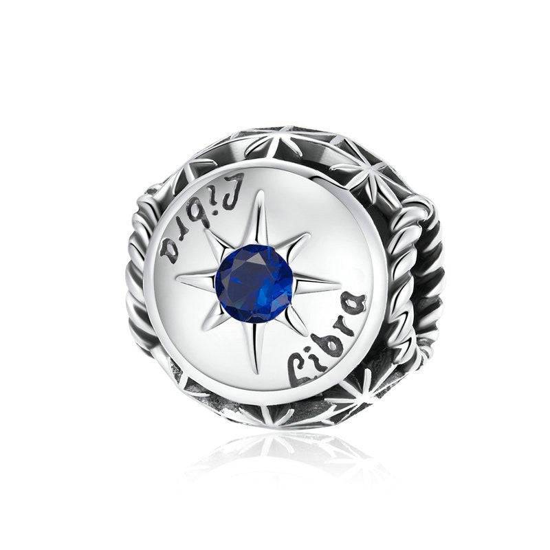 Libra Horoscope Charm featuring deep blue zircon in a star design. Elegant zodiac charm from Celestial Styles jewelry collection.