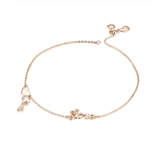 Charming Love Anklet for Bracelets featuring a delicate gold chain with 'Love' script, heart charm, and crystal accent. Ideal for romantic gifts.