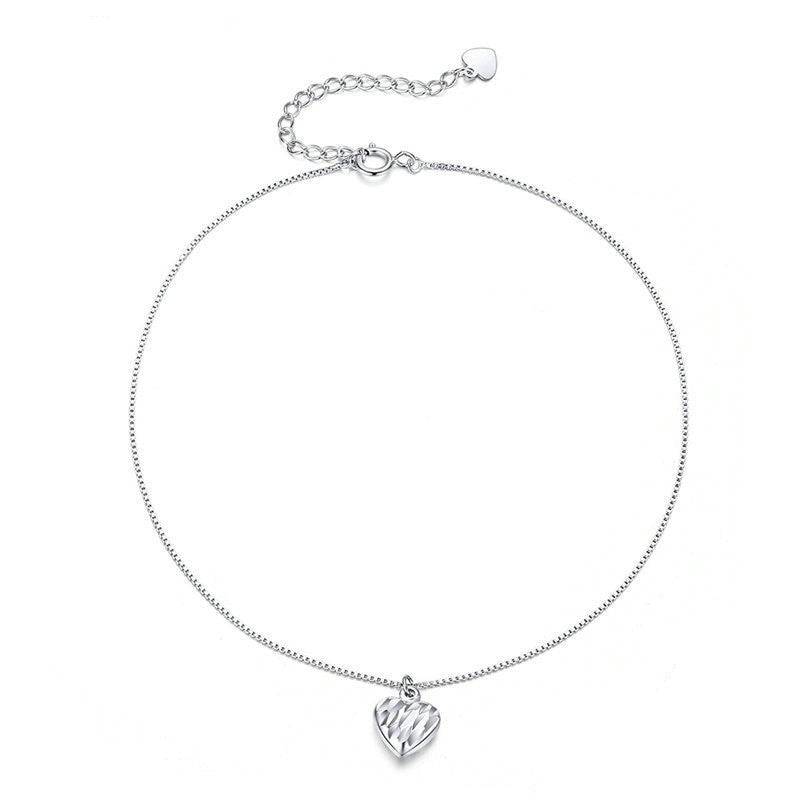 Charming Dangle Heart Anklet in sterling silver with adjustable clasp and textured heart charm. Ideal for romantic and elegant looks.
