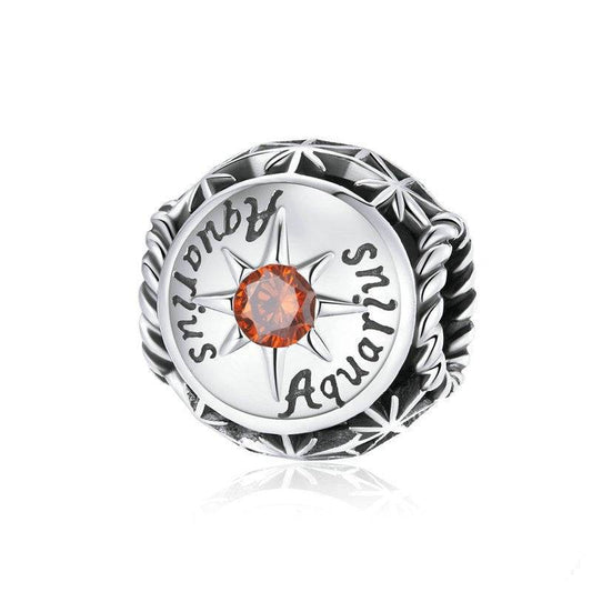 Aquarius Horoscope Charm featuring orange zircon in a starburst setting. Stylish zodiac piece from Celestial Styles jewelry collection.