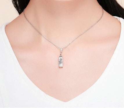Big Ben Charm worn as a necklace, adding a touch of British elegance to any outfit.
