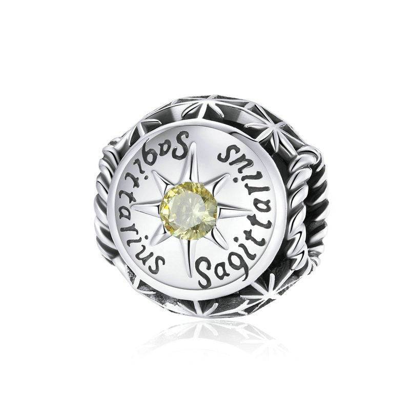 Sagittarius Horoscope Charm adorned with yellow zircon in celestial style. Zodiac jewelry piece from Zodiac Zircon Jewelry collection.