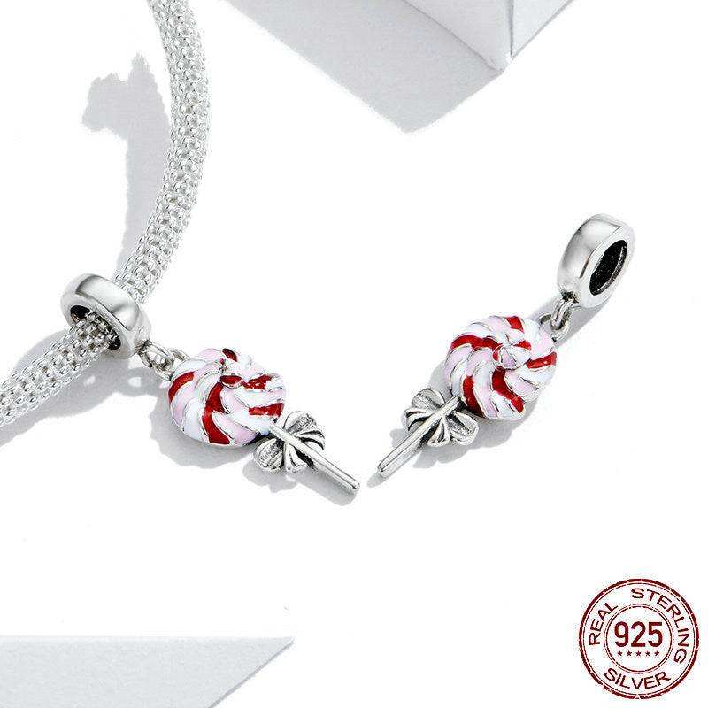 Pair of Lollipop Charms for Bracelets in red and white swirl design, made from 925 sterling silver for playful accessorizing.