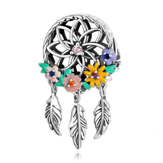 Colourful Charms dreamcatcher charm featuring floral enamel details and dangling feathers. Personalize your style with vibrant elegance.