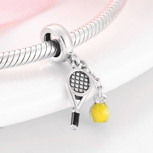 Sports Charm featuring a tennis racket and yellow ball on a silver bracelet, perfect for sporty and stylish jewelry designs.