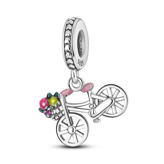 Back view of Floral Bike Charm in sterling silver with pink handlebar accents and a basket of colorful enamel flowers.