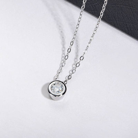 Silver Classic Moissanite Necklace featuring a 4.0MM gemstone pendant on a delicate chain. Ideal for minimalist jewelry collections.