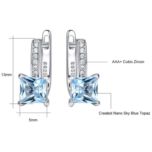 Detailed view of Sky Blue Topaz Earrings - Silver Craftsmanship with labeled dimensions and materials including AAA+ cubic zircon and 925 sterling silver.