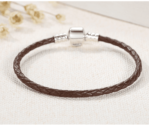Brown Stylish Silver Leather Rope Bracelet with a braided design and silver magnetic clasp, great for earthy and neutral-toned outfits.
