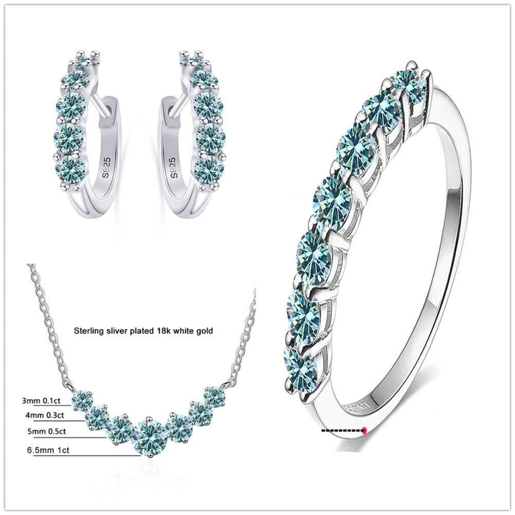 Moissanite Jewellery Set-Sterling Silver Set with icy blue stones, includes ring, earrings, and necklace. Cool-toned sparkle for elegant styling.