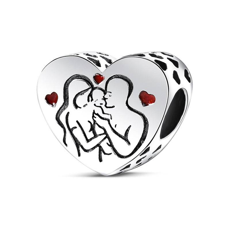 Family-themed heart charm with parents and baby illustration and red hearts. A meaningful love charm for bracelets symbolising family love.