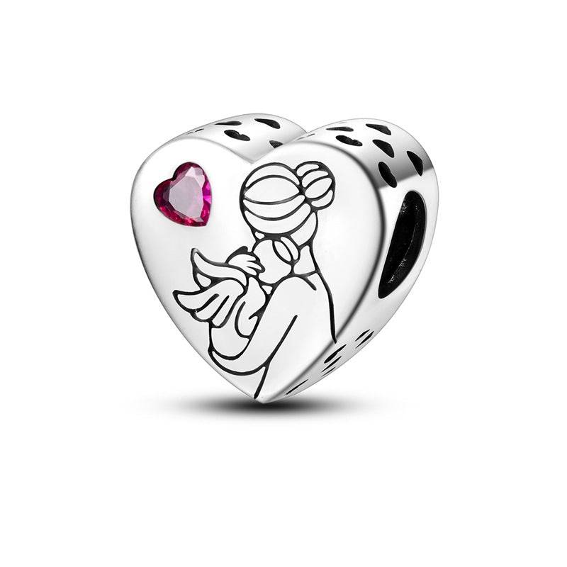 Mother and baby heart charm with pink gem heart detail. A touching love charm for bracelets celebrating maternal affection and bonding.