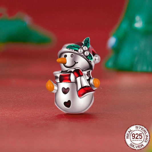 Snowman Charm from the Festive Winter Collection featuring a sterling silver snowman with red scarf and hat, perfect for Christmas jewelry lovers.