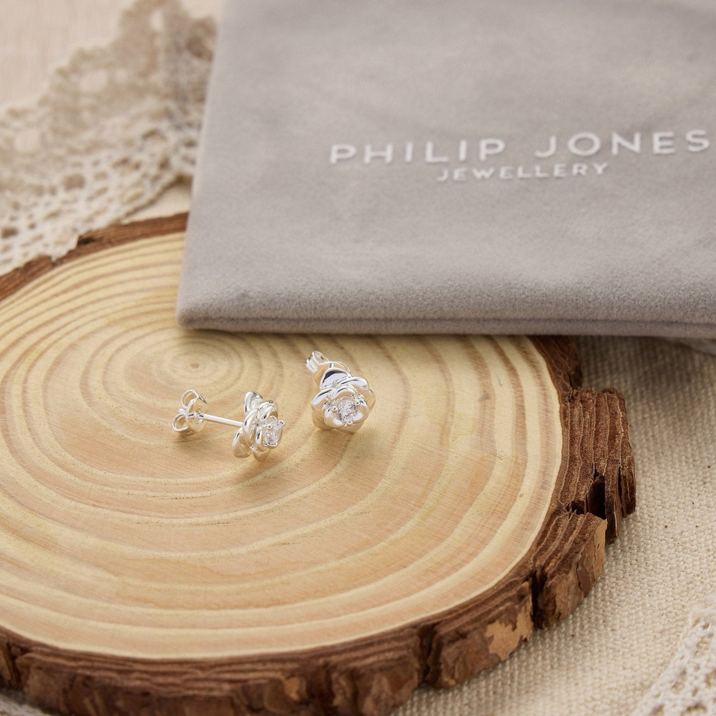 Silver Plated Rose Earrings Created with Zircondia® Crystals