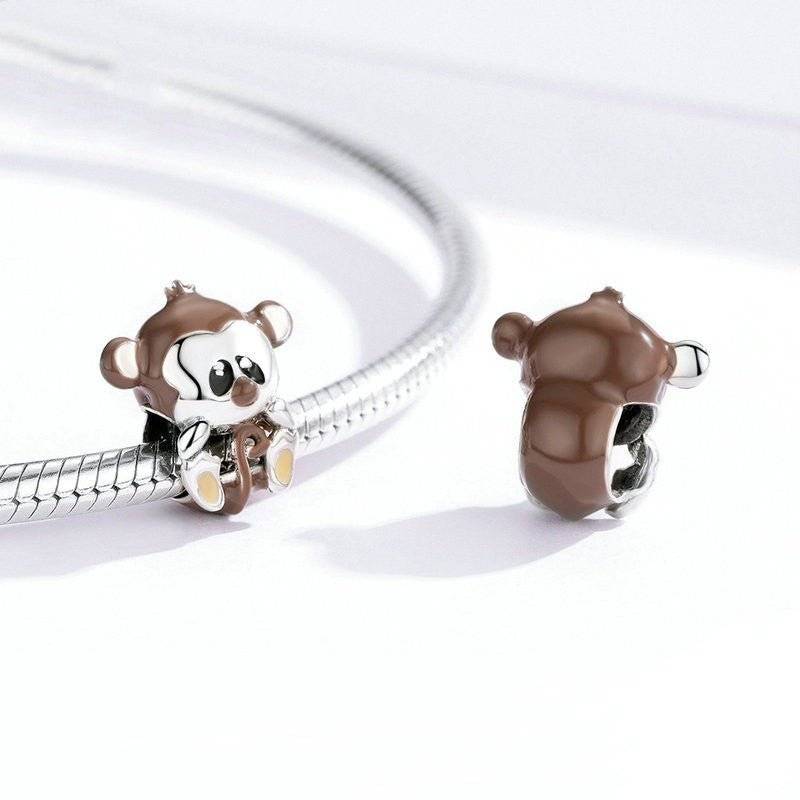 Adorable Baby Monkey Charm in brown enamel with silver details, a playful addition to your bracelet from the Jewelry Charms & Pendants category.