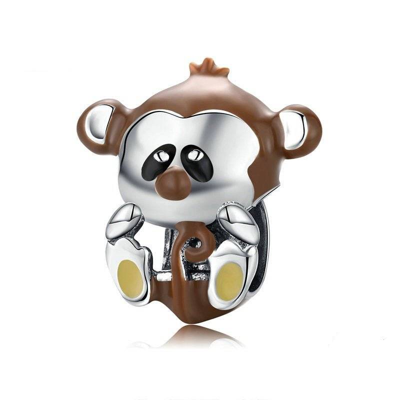 Adorable Baby Monkey Charm with brown enamel and silver finish, perfect playful addition to bracelets in the jewelry charms category.