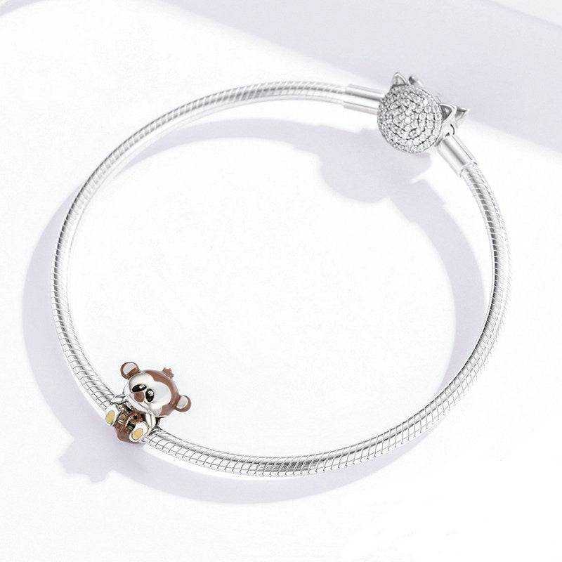 Adorable Baby Monkey Charm on silver bracelet, a playful addition to your jewelry collection. Perfect for charm bracelets in cute animal designs.