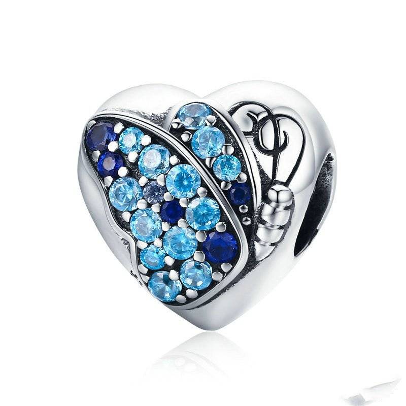 Blue Butterfly Charm in heart shape with sparkling blue crystals, symbolizing freedom and beauty. Ideal for charm bracelets and pendants.