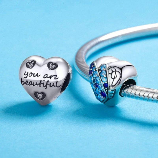 Blue Butterfly Charm - Embrace Freedom & Beauty 🦋💙 featuring heart-shaped design with 'you are beautiful' engraving and blue crystal butterfly wings.