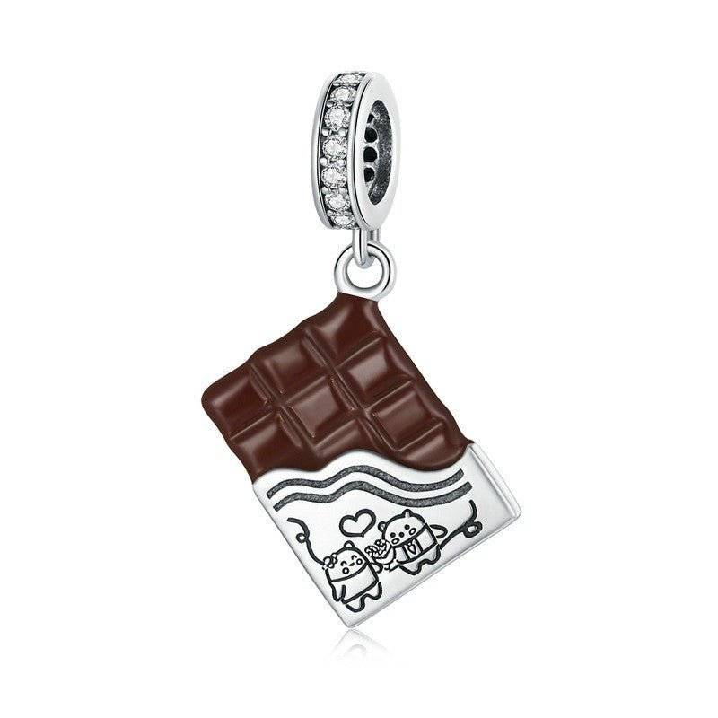Delicious Chocolate Charm featuring a brown chocolate bar with cute cartoon characters and heart design, perfect for dessert-themed jewelry.