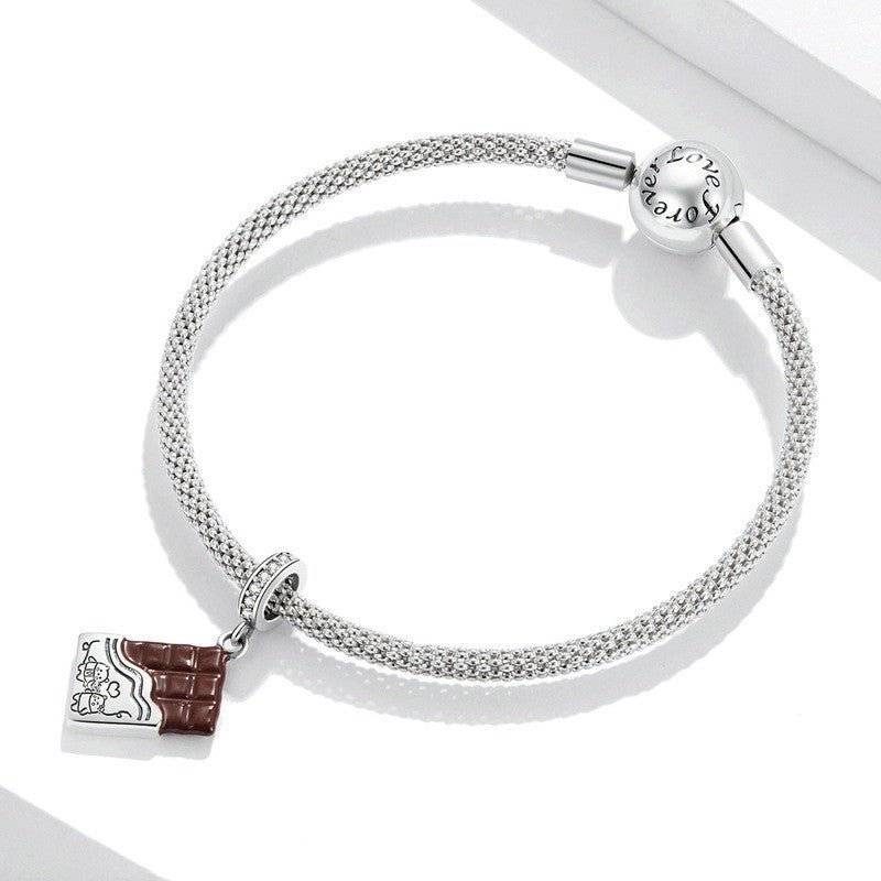 Delicious Chocolate Charm on silver mesh bracelet, featuring a detailed chocolate bar design. Ideal for dessert lovers and charm collectors.