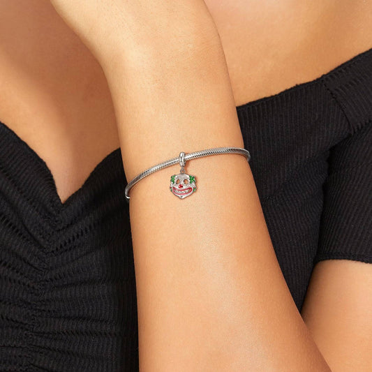 Whimsical Clown Charm for Bracelets shown on wrist, highlighting its fun circus design and vibrant enamel details for a joyful accessory look.