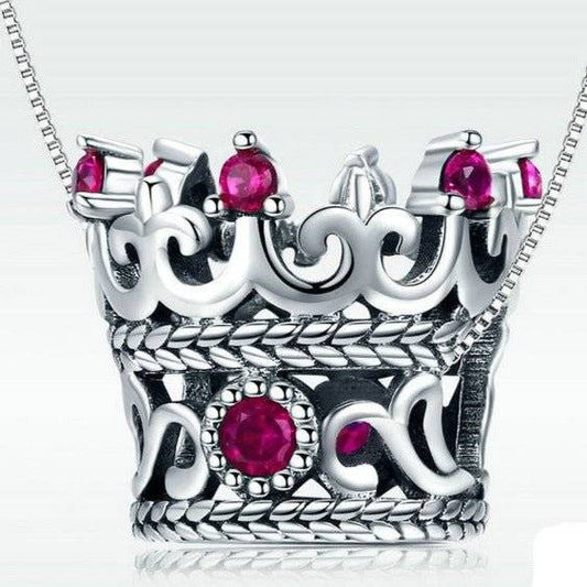 Crown Charm - Add a Royal Touch to Your Bracelet 👑✨ with intricate silver detailing and vivid red gemstones, perfect for elegant jewelry collections.