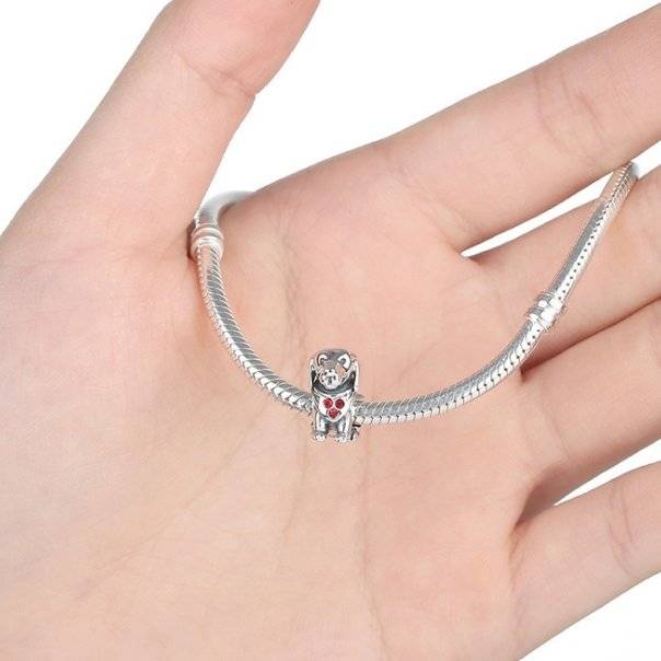 Adorable Dachshund Charm on silver bracelet, featuring detailed dog design with red heart accent. Ideal jewelry piece for dog lovers 🐾🐶.