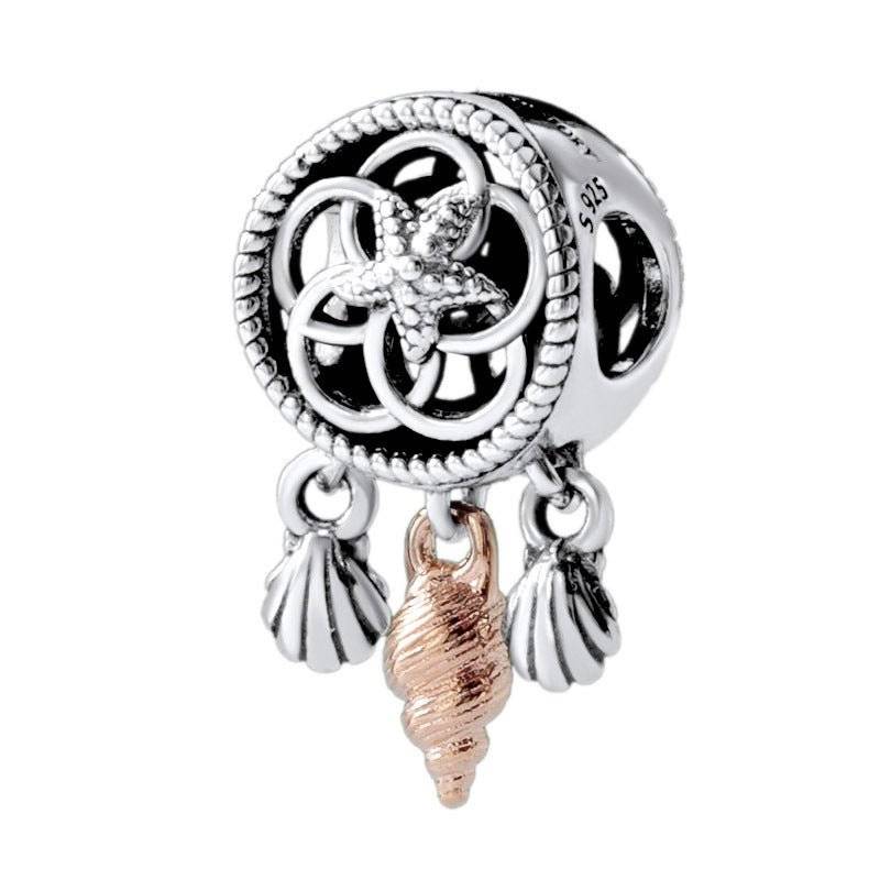 Dreamcatcher Charm - Capture Your Dreams & Wishes 🌙✨ featuring intricate silver detailing with a rose gold seashell pendant, ideal for bracelets.