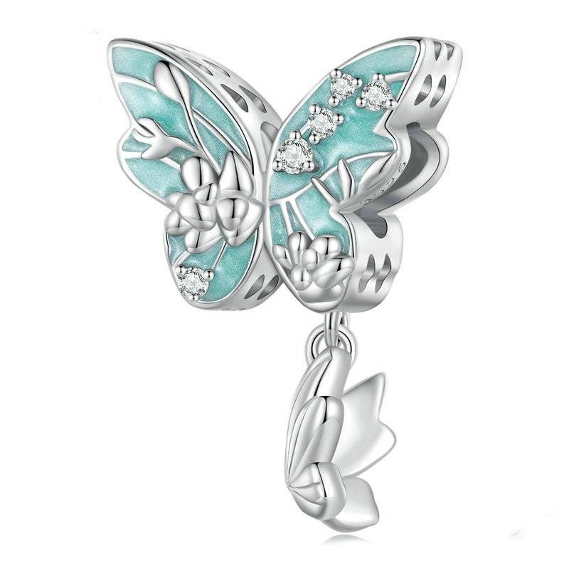 Floral Butterfly Charm - Nature’s Beauty & Transformation 🦋🌸 in silver with turquoise enamel wings, floral detailing, and crystal accents. Ideal for charm bracelets.